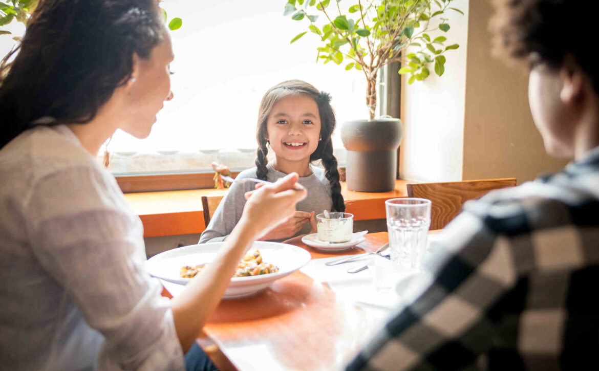 Family having lunch at a family-owned restaurant in California