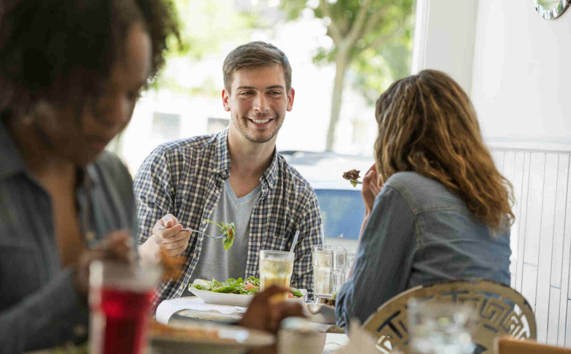 Friends having lunch together at a local diner in Vista Ca