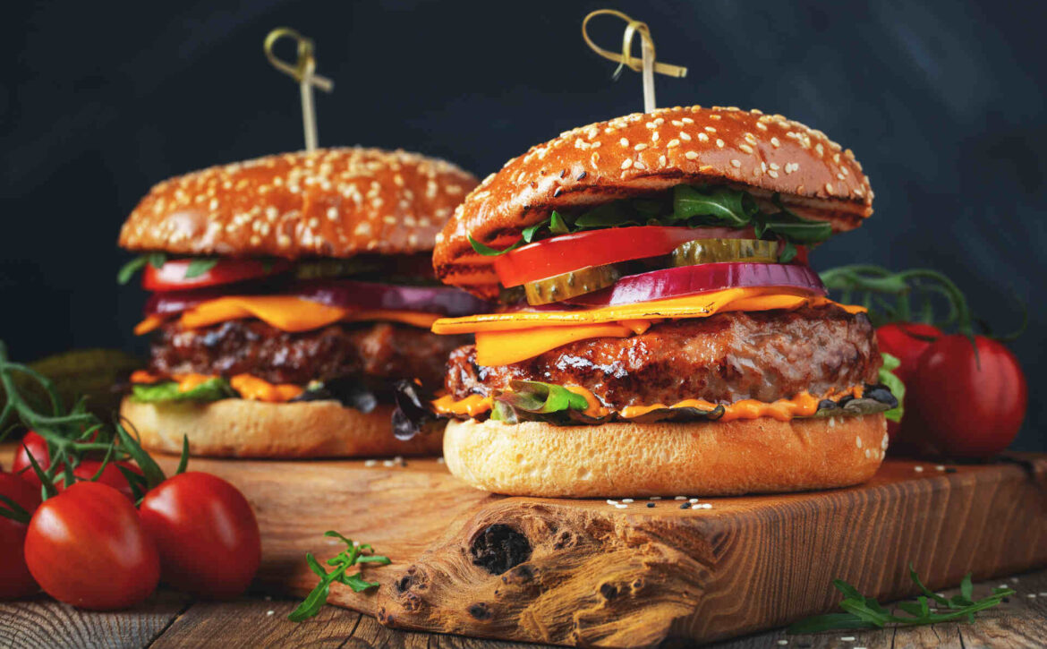 two hamburgers being served in Vista